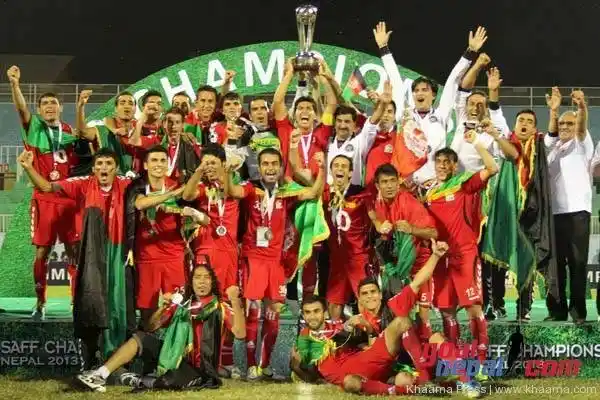 Afghan football players celebrating victory